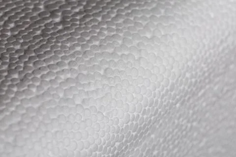 Simple close-up bumpy background of white polystyrene foam or styrofoam, white Stock Photos