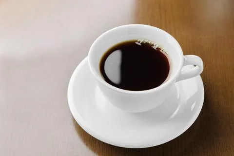 Simple coffee in a white cup Stock Photos
