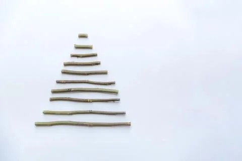 A simple composition of dry sticks in the shape of a triangle, arrows Stock Photos