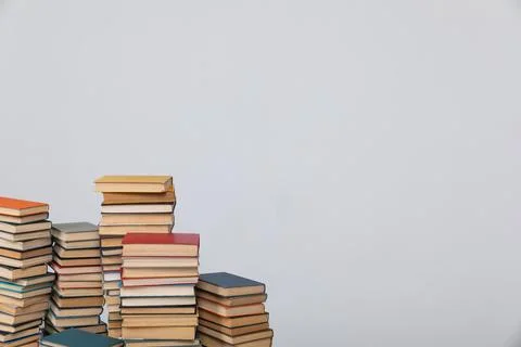 A simple composition of many books, stack or pile of books on wooden table, one Stock Photos