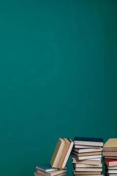 A simple composition of many books, stack or pile of books on wooden table, one Stock Photos