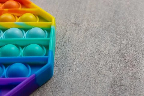 Simple Dimple. Pop It. New sensory toy, antistress for children and adults. Stock Photos