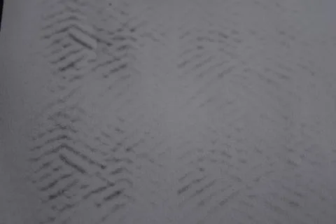 A simple drawing on clean white paper with an interesting black texture. Stock Photos