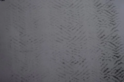 A simple drawing on clean white paper with an interesting black texture. Stock Photos