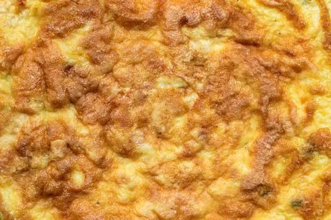 Simple egg omelette with herbs on white background Stock Photos
