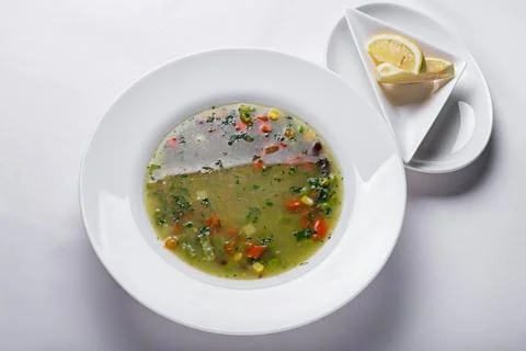 Simple Elegance, Fresh Vegetable Soup on a White Plate Stock Photos