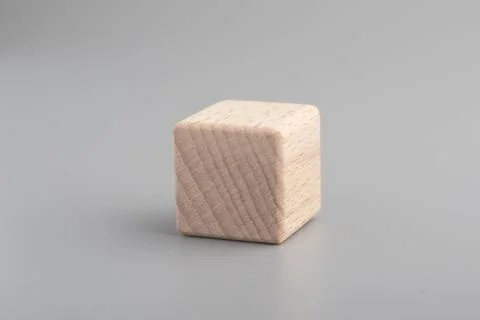 Simple empty wooden dice, one blank cubes made of wood with one central ele.. Stock Photos