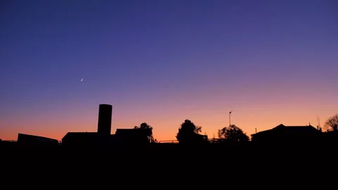Simple Farm Silhouette at Sunset Stock Footage 220335371