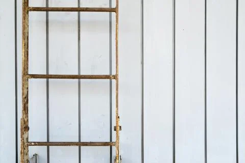 Simple fixed ladder filled with rust Foto stock