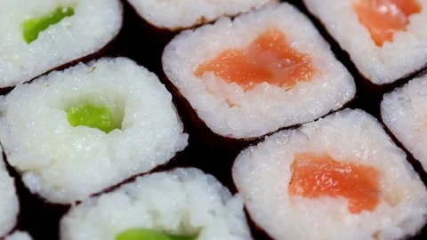 Simple fresh sushi on a plate rotating 4k 30fps video Stock Footage 260503227