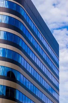 Simple generic building of a modern architecture with glass windows, Corpor.. Stock Photos