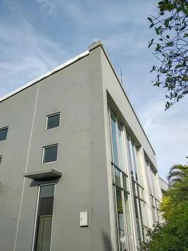 Simple gray facade of the building Stock Photos