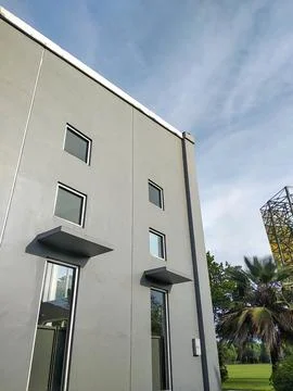 Simple gray facade of the building Stock Photos