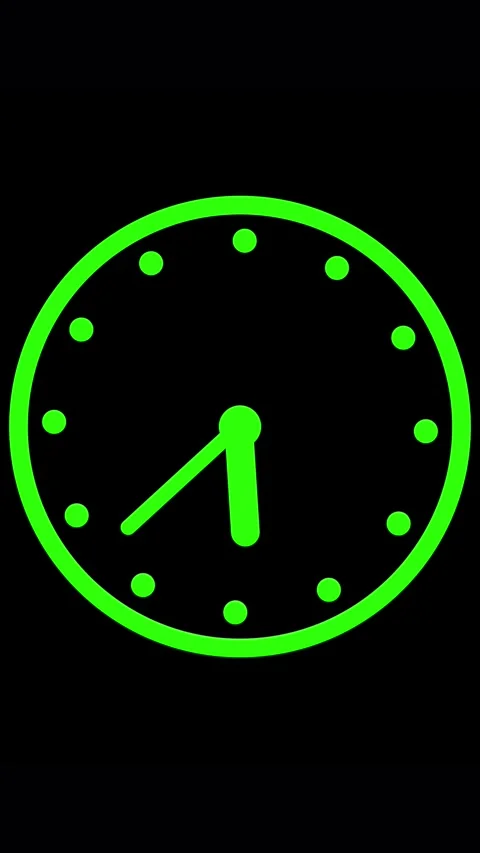 Simple green clock face with hands on black background. Green clock face ti.. Stock Footage 344841772