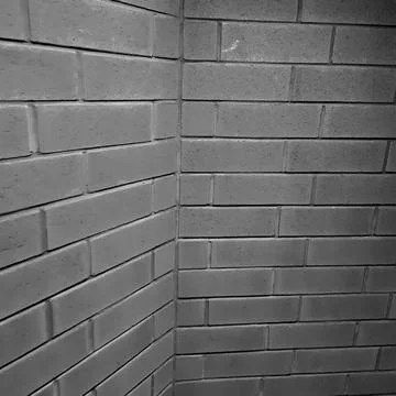 Simple Greyscale Brick Wall Background Stock Photos