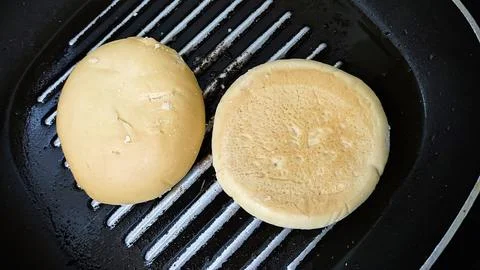Simple hamburger placed on the table for product display. Stock Photos