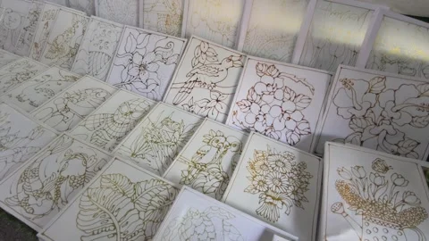 Simple Hand-Drawn Wax Canting Patterns on Framed Fabric for Beginner Batik Art Stock Footage 333480866