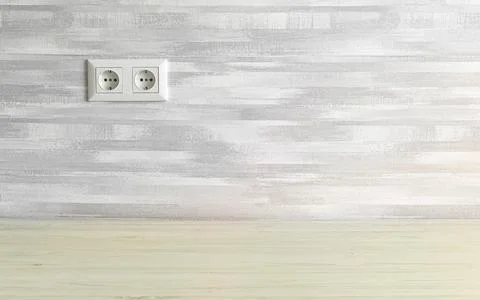 Simple home interior with power socket on gray wall, copy space photo Stock Photos