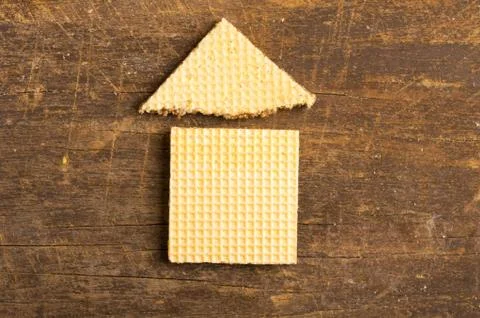 Simple house design illustrated by using rectangular and a triangular cookie on 스톡 사진