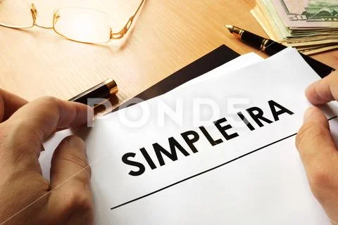 SIMPLE IRA (Savings Incentive Match Plan for Employees) concept. Stock Photos