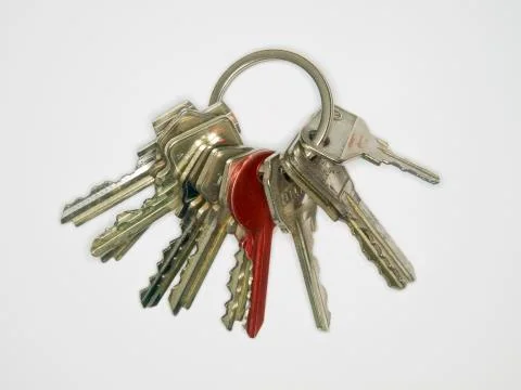 A simple keyring with a red key Stock Photos