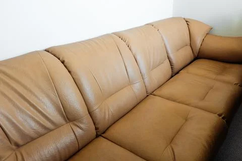 Simple leather brown soft sofa Stock Photos