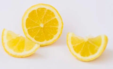 Simple lemons on white Stock Photos