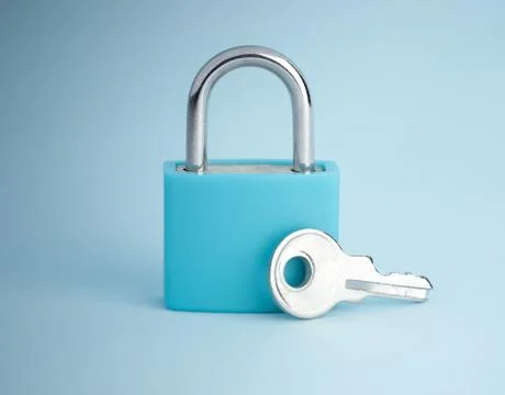 Simple lock and key. Small padlock with small shiny key. Business data encr.. Stock Photos