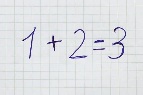 A simple math problem: 1 2 3, written in blue pen in a grid notebook. School, Stock Photos