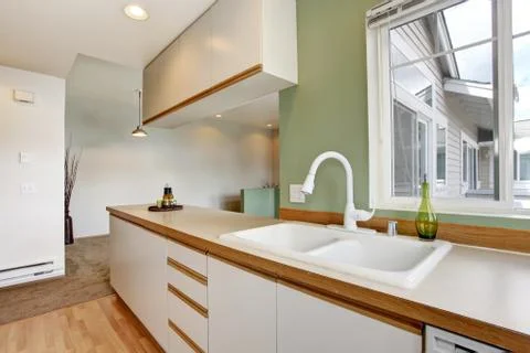 Simple mint kitchen interior in empty house Stock Photos