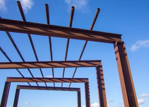 Simple modern design stylish rusty pergola made with industrial grade material Stock Photos