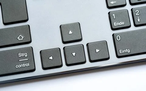 Simple modern office desktop PC, computer keyboard arrow keys, object detai.. Stock Photos