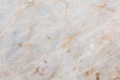 Simple natural marble texture in light tone. Stock Photos