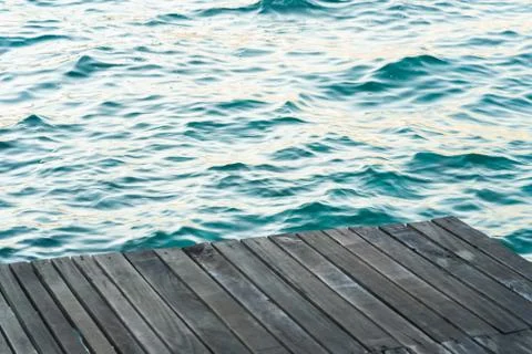Simple panoramic background wallpaper pattern of wooden deck floor sea waterf Stock Photos