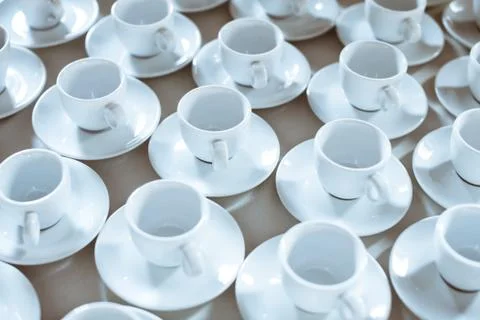 Simple pattern made of empty cups of coffee Stock Photos