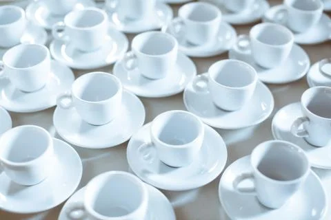 Simple pattern made of empty cups of coffee 스톡 사진