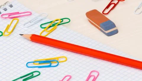 Simple pencil Notebook paper clips on a desk Stock Photos