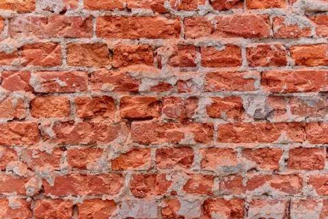 Simple photo background pattern of red broken bricks wall. Stock Photos