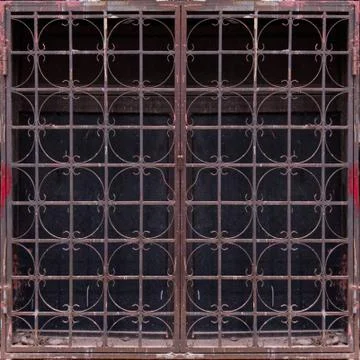 Simple photo background pattern of window with rusty shutters. Stock Photos