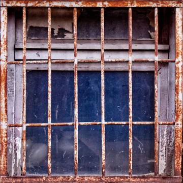 Simple photo background pattern of window with rusty shutters. Stock Photos