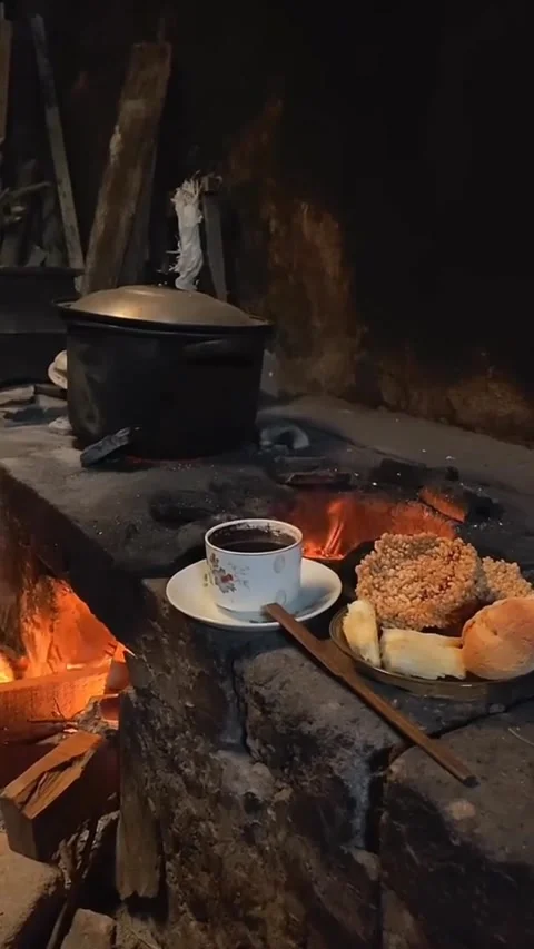 Simple Pleasures: Combing Memories with a Cup of Coffee in a Traditional Kitchen Stock Footage 262586684