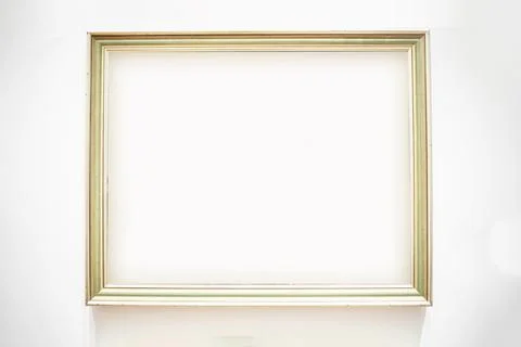 Simple profiled wooden frame painted light on a light background Stock Photos