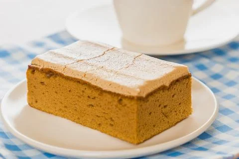 Simple rectangular cake dusted with powdered sugar Stock Photos