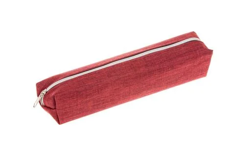 A simple red fabric pencil case with a zipper, perfect for school supplies,.. Stock-Fotos