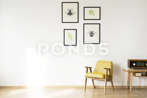 Simple retro room with armchair Stock Photos