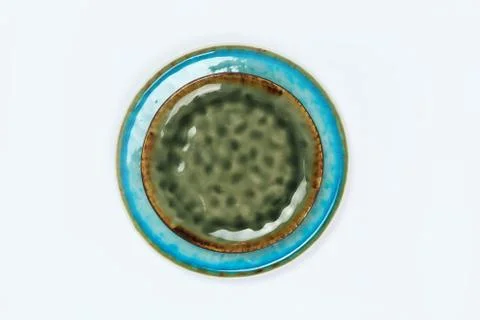 Simple rustic blue handmade dishes on a white background Stock Photos