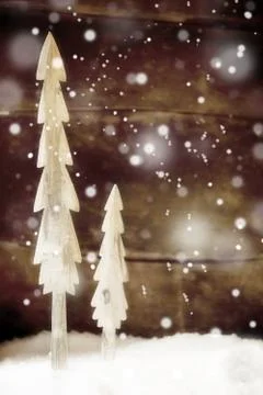 Simple rustic christmas trees in snow Stock Photos