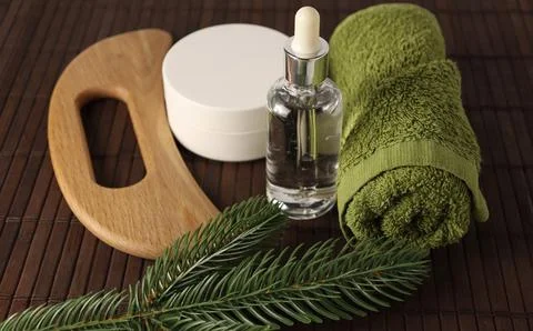Simple setup for a home spa experience with towels, essential oils, and natural Stock Photos