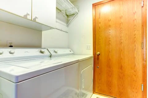 Simple small laundry area Stock Photos