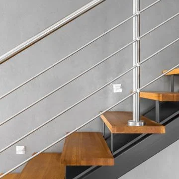 Simple staircase with chromed railing Stock-Fotos